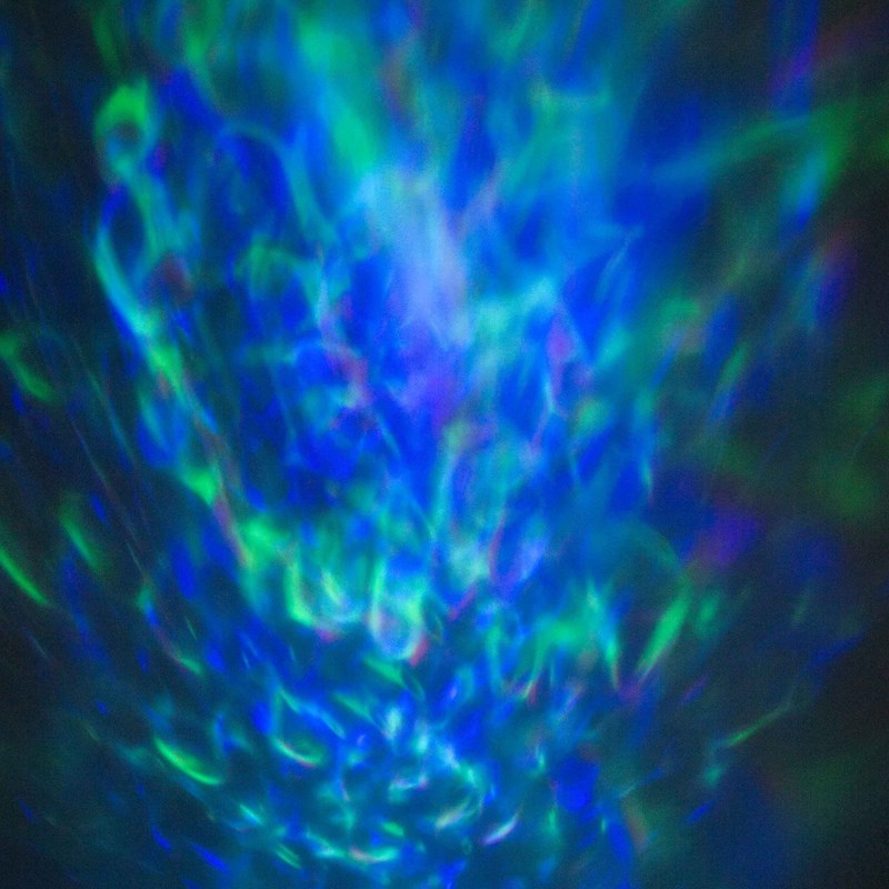 Effet lumineux 4-en-1 - Astro, Strobe, UV & Effet Eau avec télécommande compacte